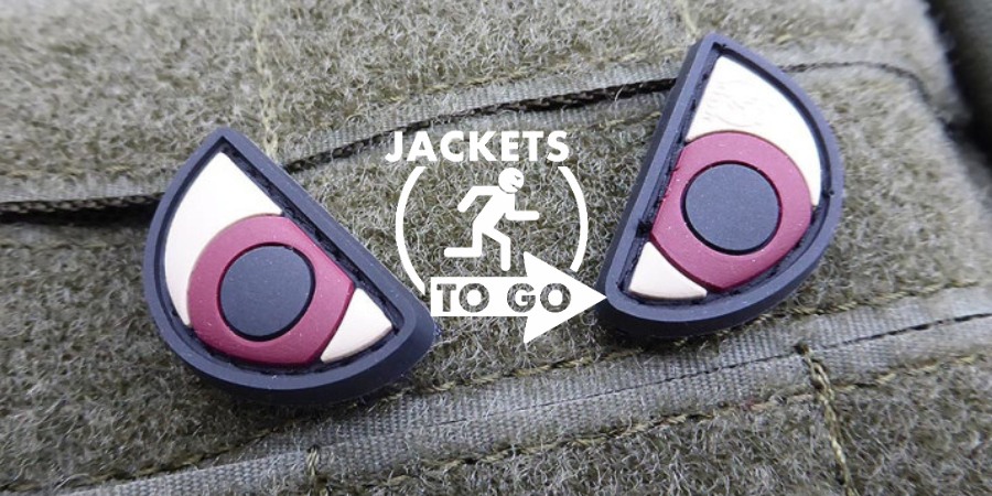 Patch velcro Angry Eyes sur passants MOLLE auto-agrippants.